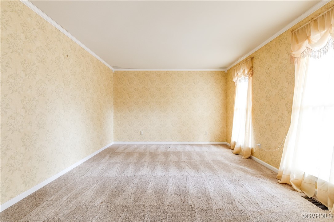 4588 Broad St Road Gum Spring, VA 23065 - Photo 8 of 50 a view of an empty room with wooden floor and a window