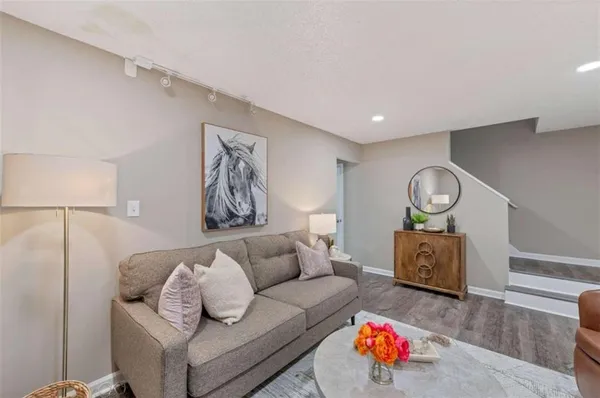 a living room with furniture and a couch