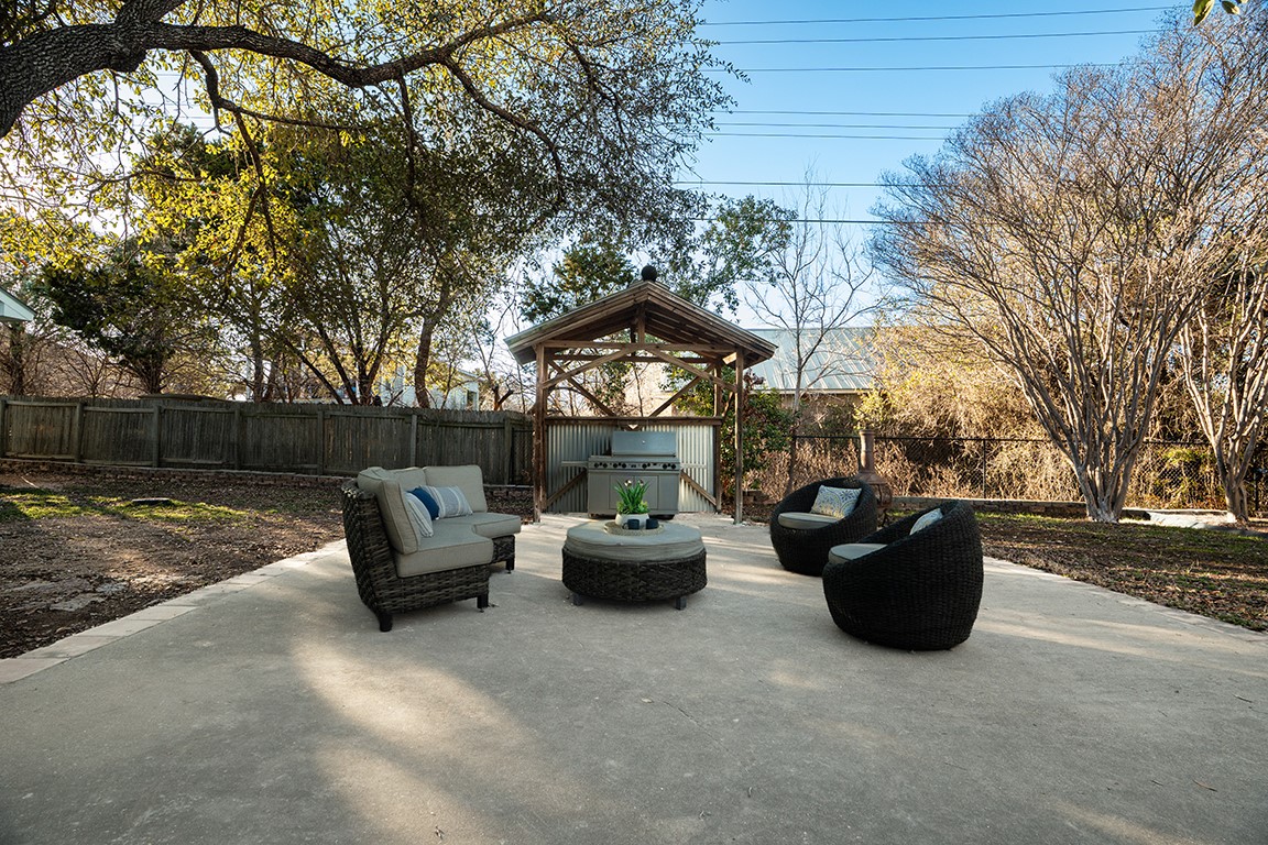 5108 Sioux Lane Austin, TX 78734 - Photo 32 of 35 a view of a patio with couches and a fire pit