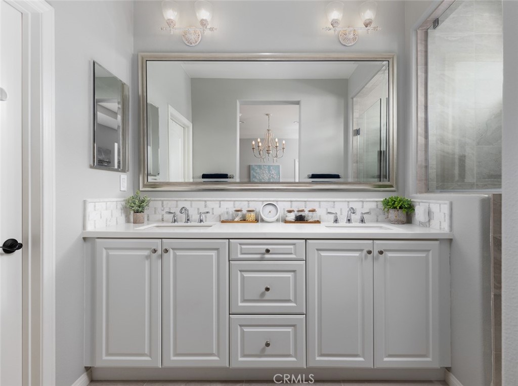 193 Barnes Road Tustin, CA 92782 - Photo 11 of 45 a sink with a mirror