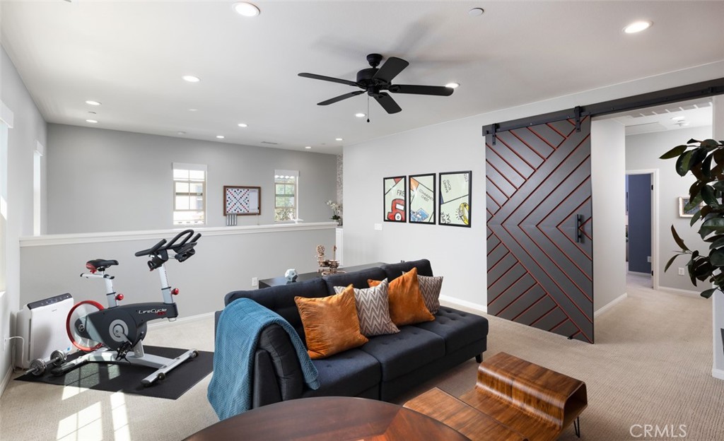 193 Barnes Road Tustin, CA 92782 - Photo 19 of 45 a living room with furniture and a window