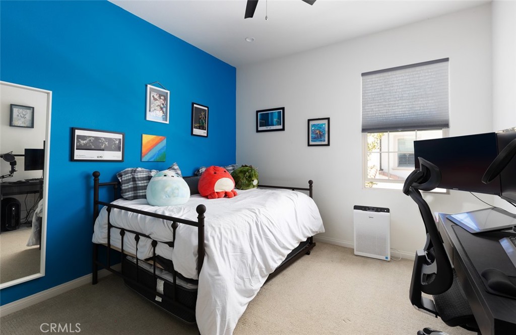 193 Barnes Road Tustin, CA 92782 - Photo 22 of 45 a bedroom with a bed and furniture