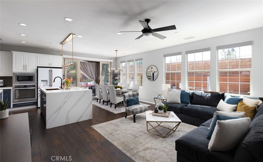 193 Barnes Road Tustin, CA 92782 - Photo 3 of 45 a living room with furniture and a large window