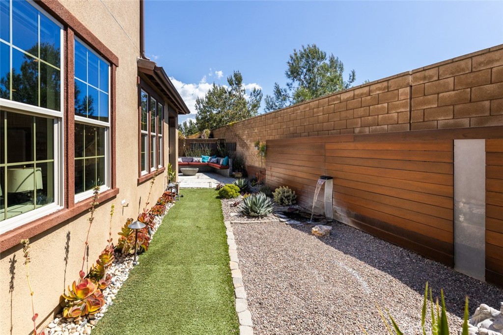 193 Barnes Road Tustin, CA 92782 - Photo 32 of 45 a view of a pathway with a backyard