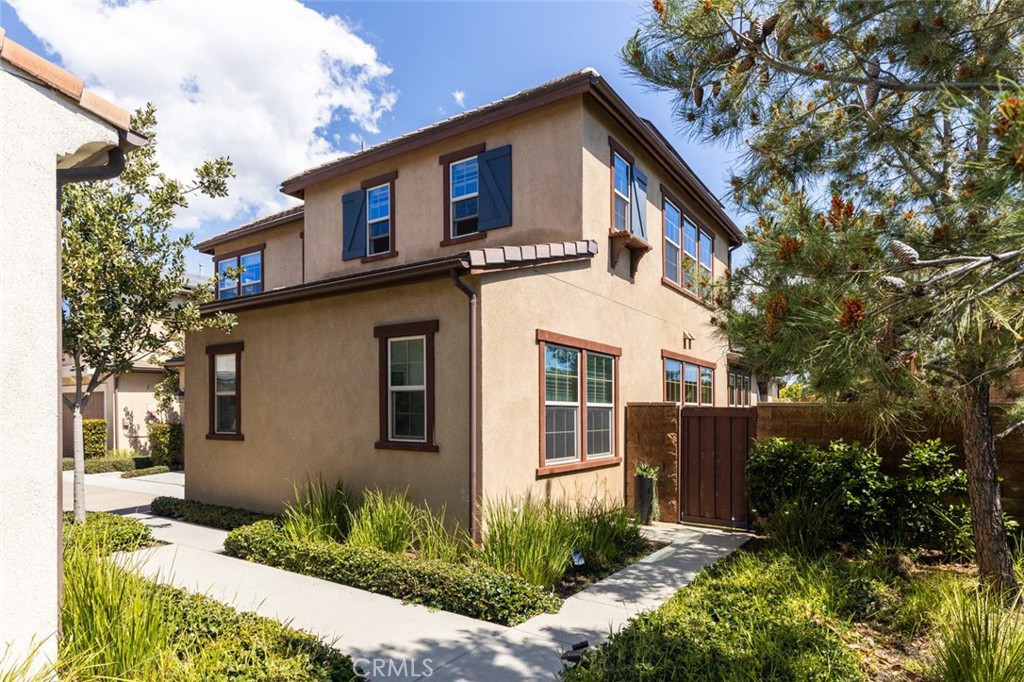 193 Barnes Road Tustin, CA 92782 - Photo 34 of 45 a front view of a house with garden
