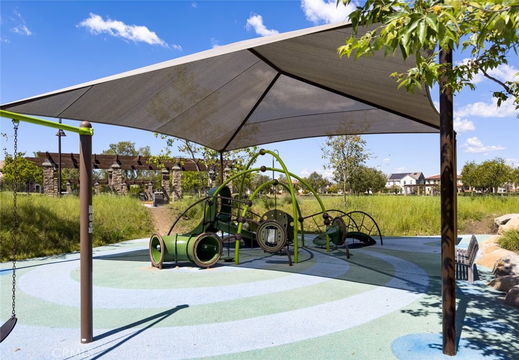 193 Barnes Road Tustin, CA 92782 - Photo 42 of 45 a view of a swimming pool with a patio