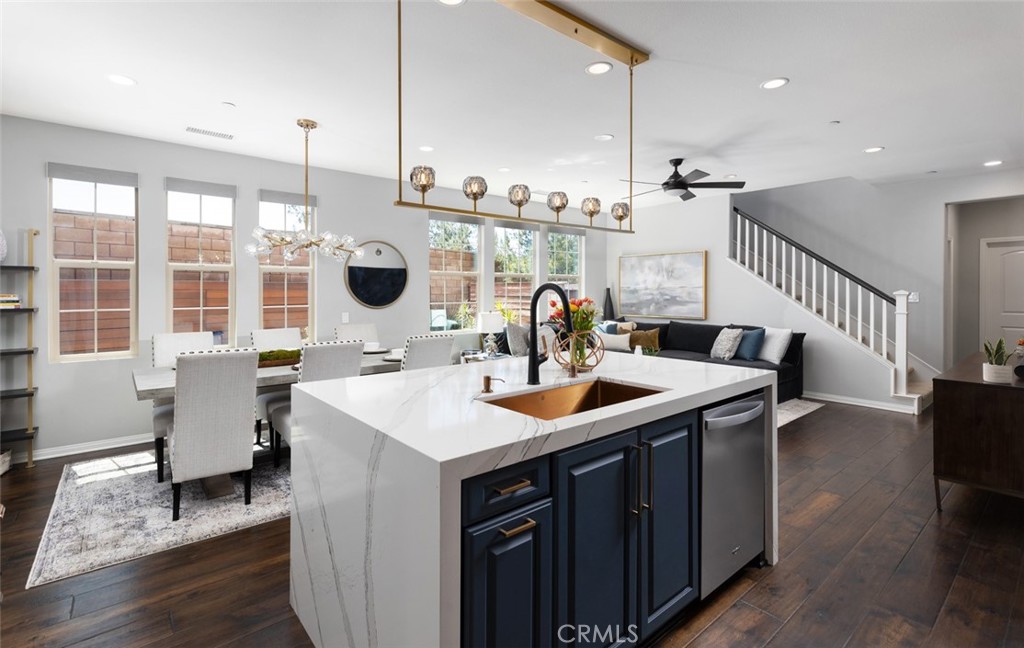 193 Barnes Road Tustin, CA 92782 - Photo 7 of 45 a view of kitchen and sink with living room