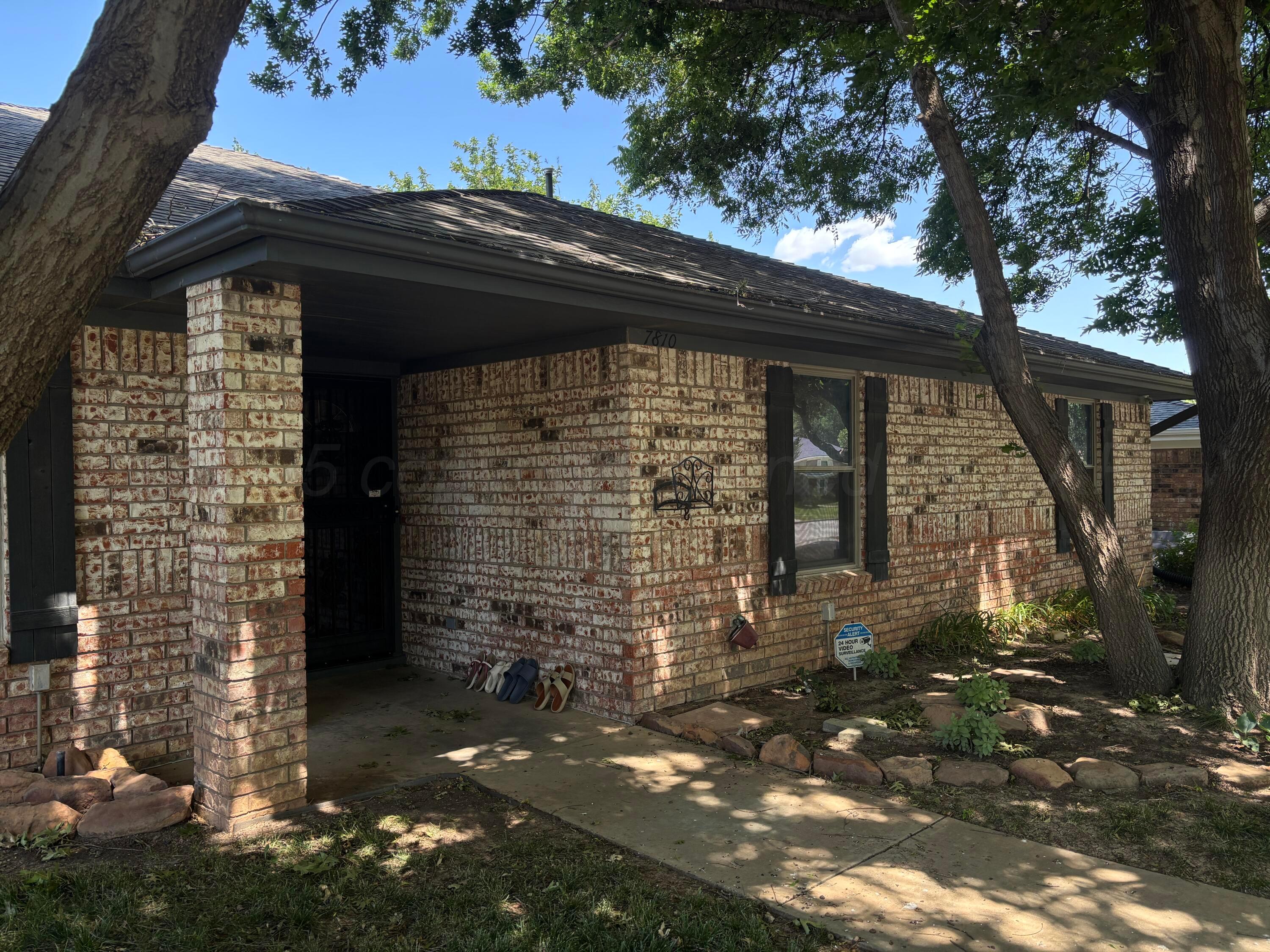 7810 Farrell Drive Amarillo, TX 79121 - Photo 2 of 31 a front view of a house