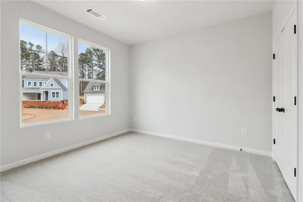 an empty room with windows