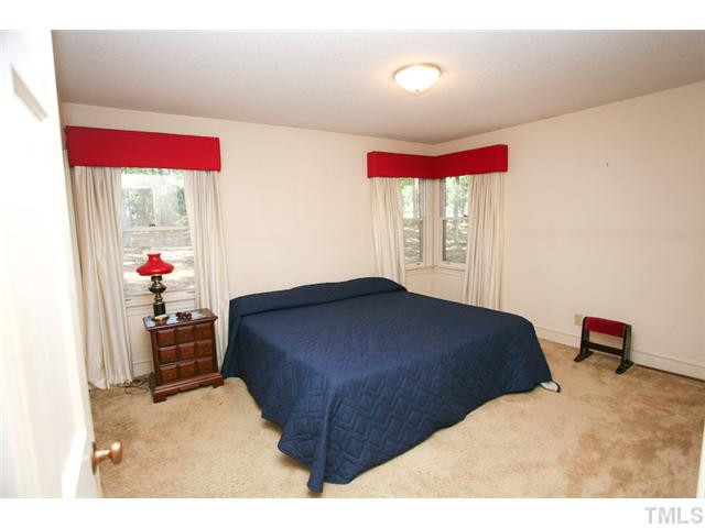 1000 Mulberry Road Clayton, NC 27520 - Photo 15 of 24 Secondary Bedroom w/corner window and single window and 2 large double closets Bedroom