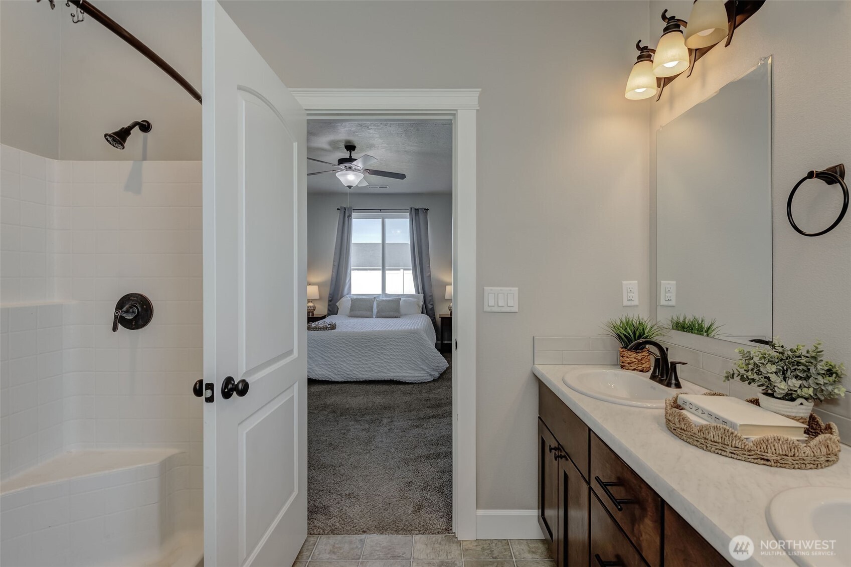 415 R Street Southwest Quincy, WA 98848 - Photo 16 of 33 a bathroom with a sink a tub and mirror