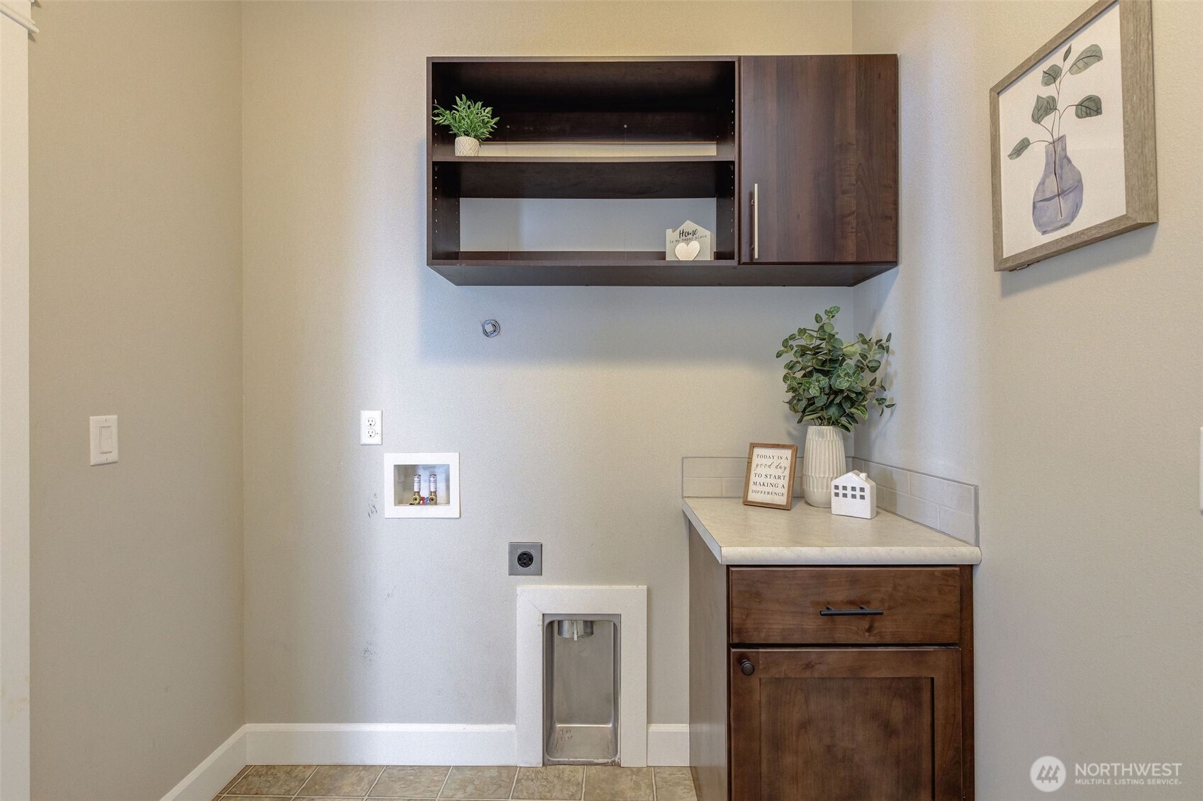 415 R Street Southwest Quincy, WA 98848 - Photo 18 of 33 a bathroom with a sink and a microwave