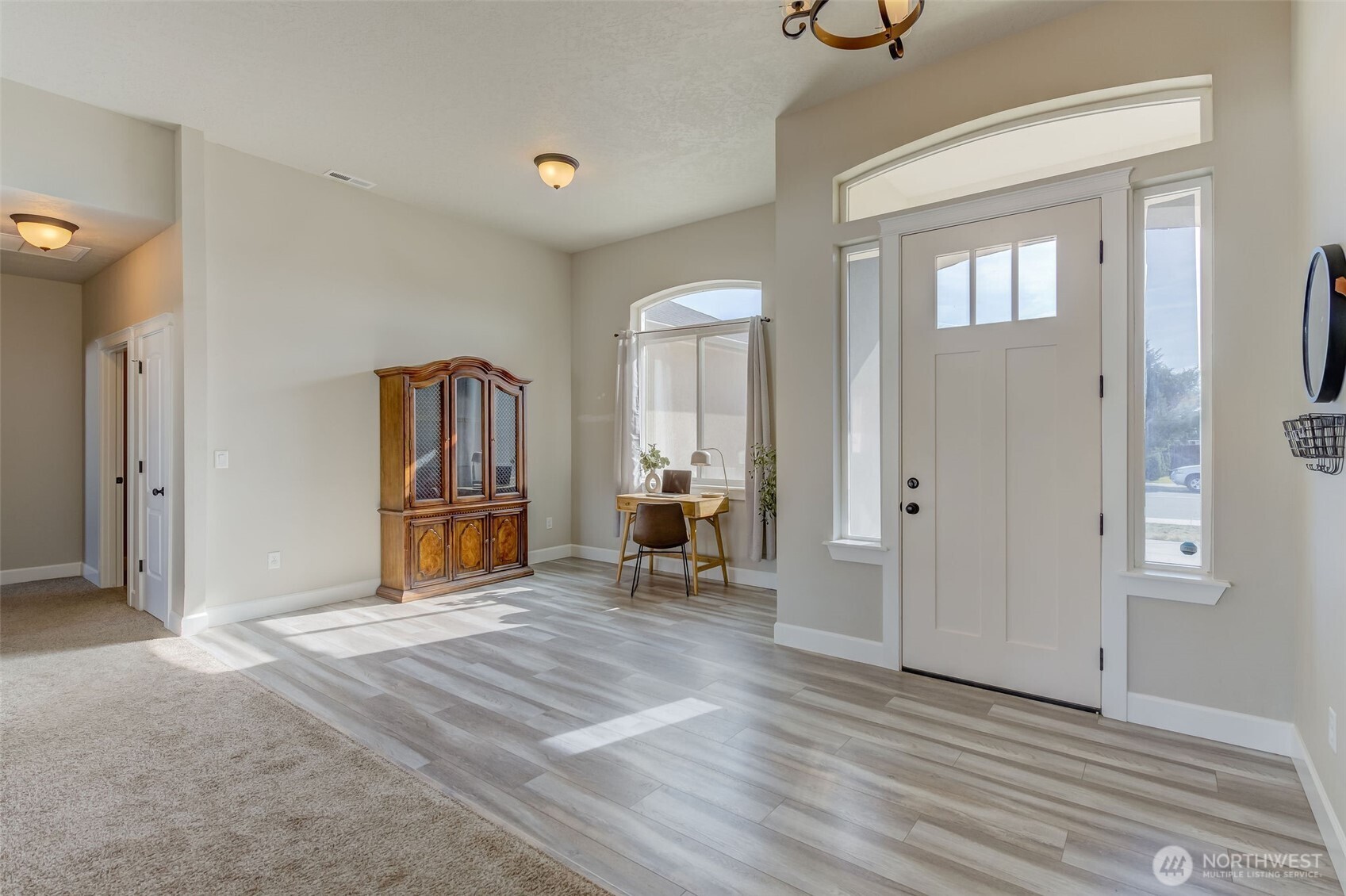 415 R Street Southwest Quincy, WA 98848 - Photo 2 of 33 a view of a livingroom with wooden floor and a sink