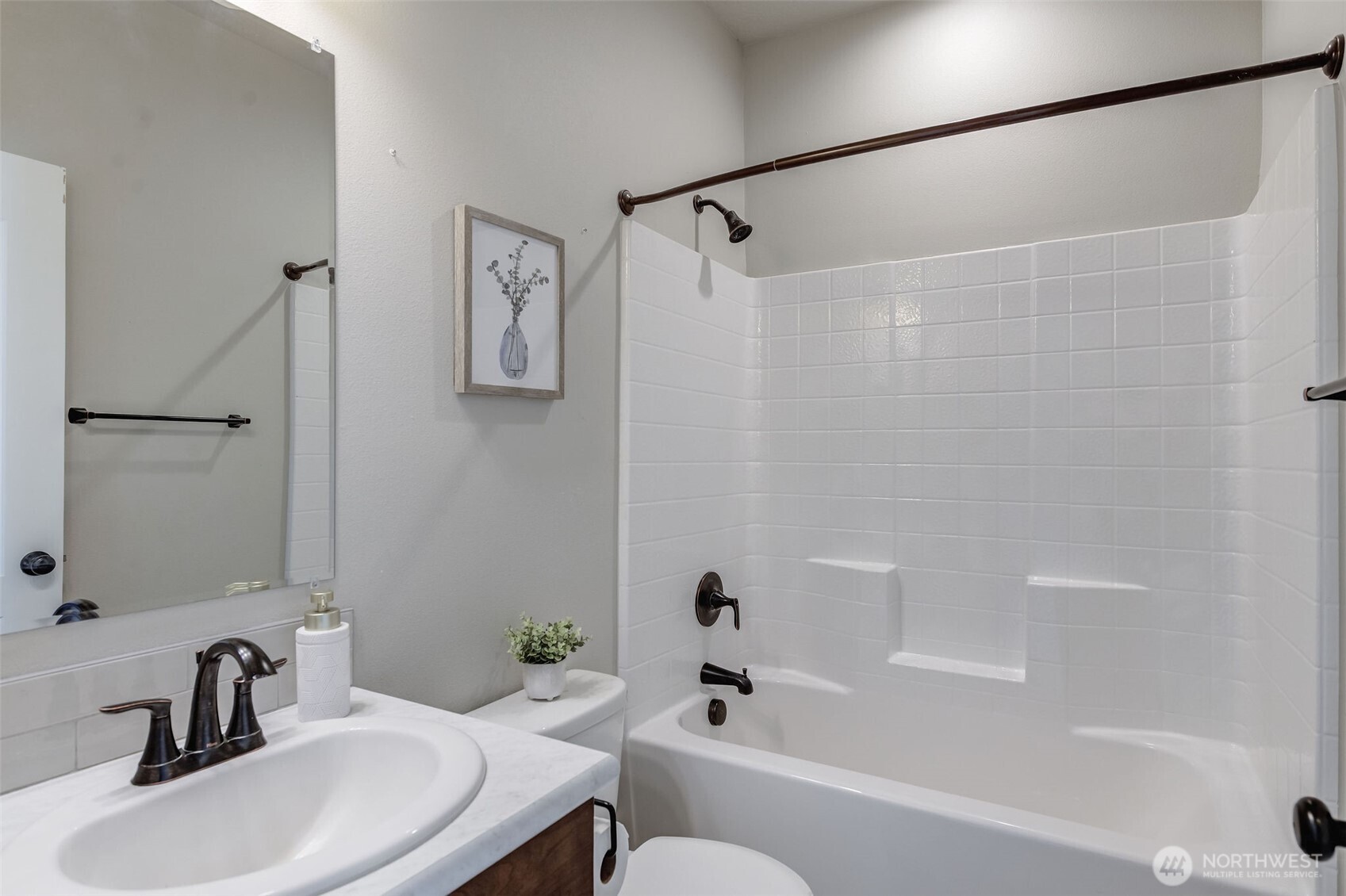415 R Street Southwest Quincy, WA 98848 - Photo 22 of 33 a bathroom with a sink and a mirror