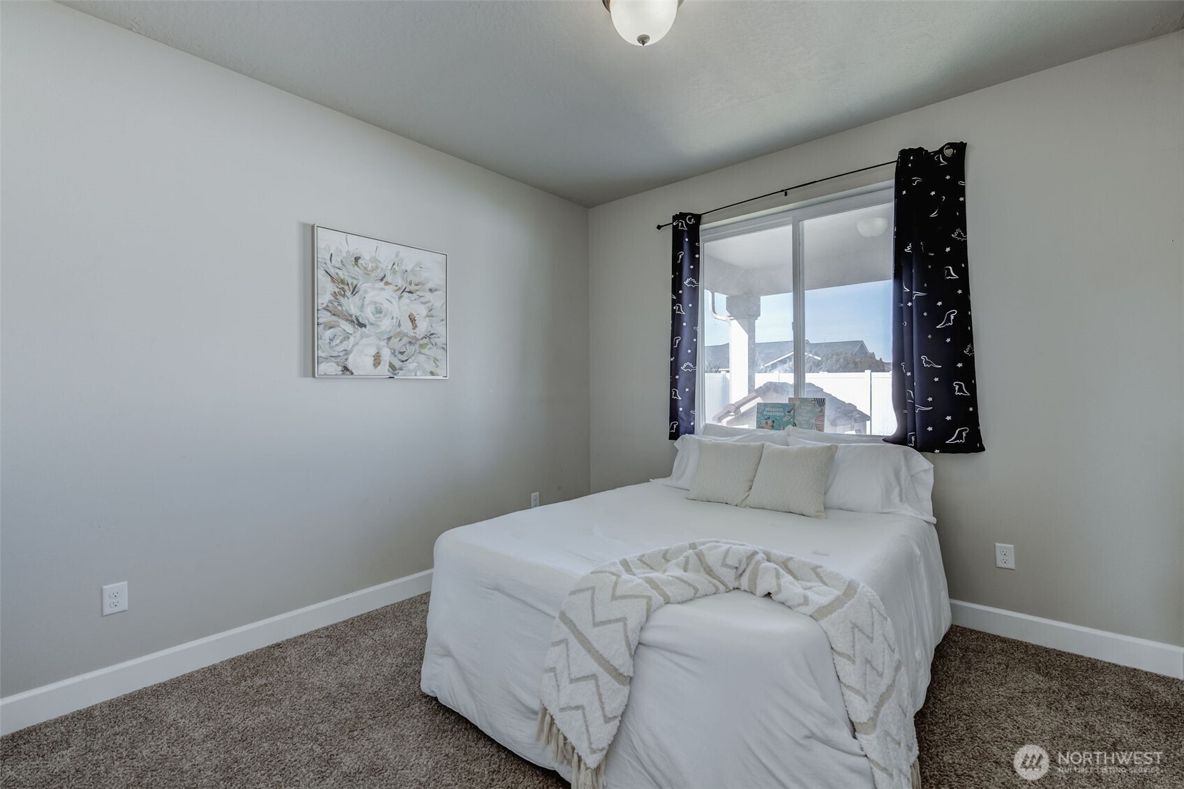 415 R Street Southwest Quincy, WA 98848 - Photo 23 of 33 a bedroom with a bed and a window