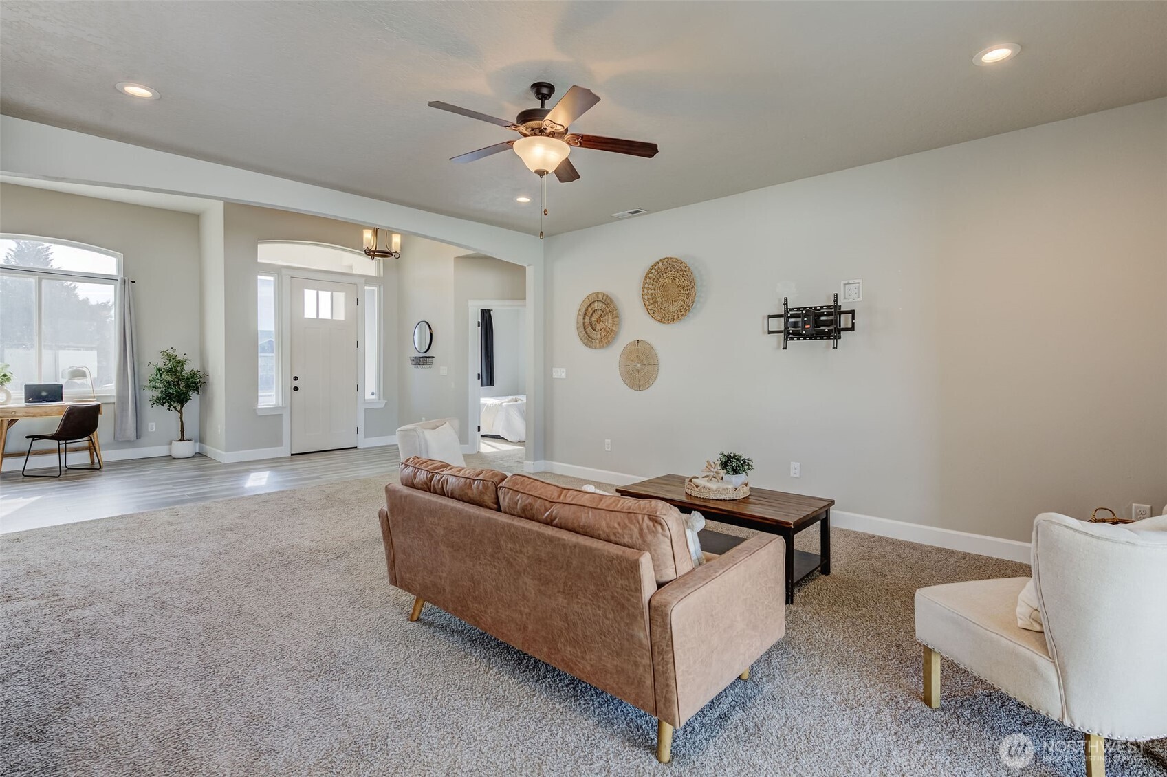 415 R Street Southwest Quincy, WA 98848 - Photo 3 of 33 a living room with furniture and a chandelier