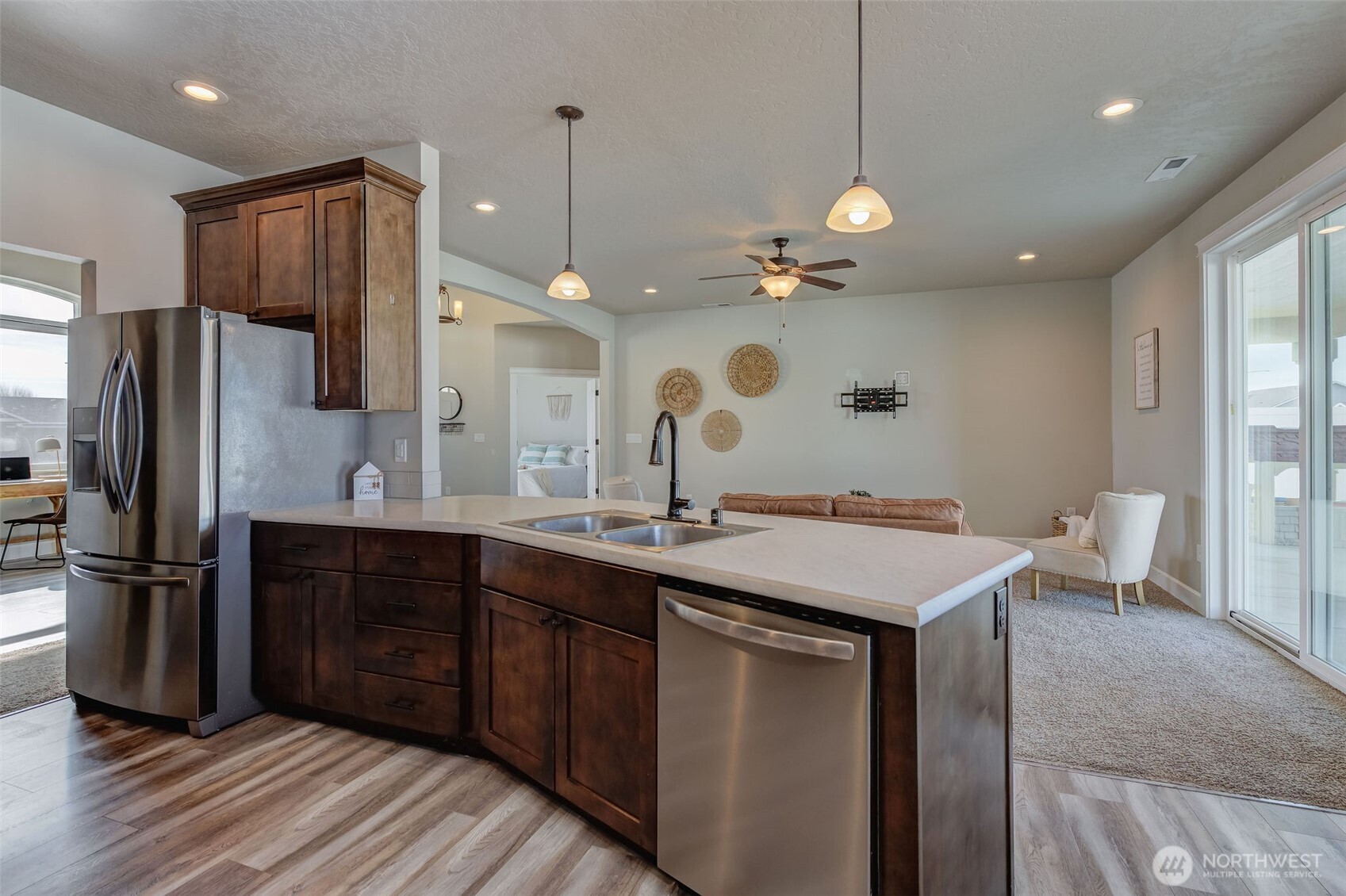 415 R Street Southwest Quincy, WA 98848 - Photo 10 of 33 a kitchen with a sink a counter space appliances and cabinets