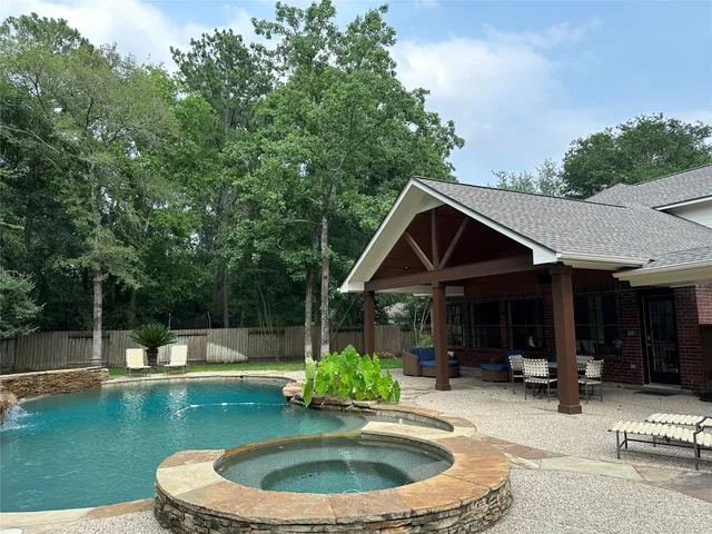 a house view with a sitting space and garden space