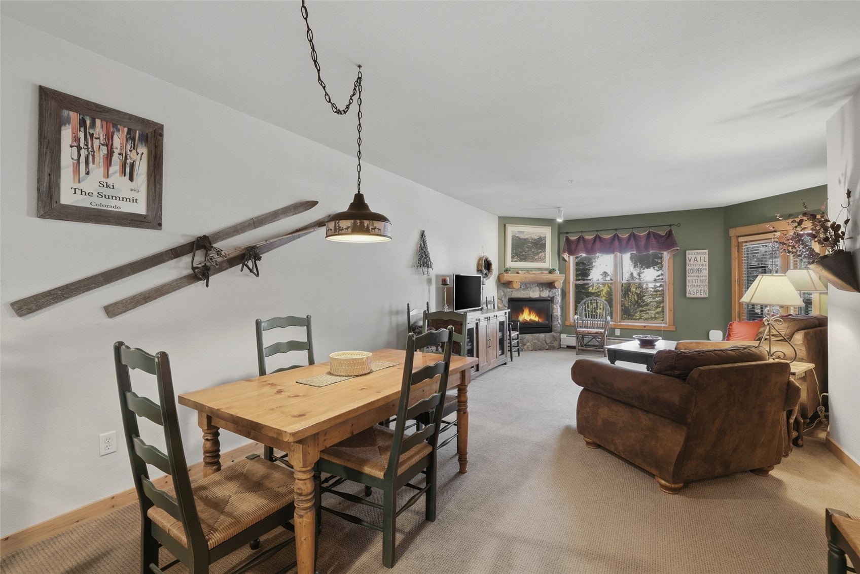22784 Highway 6, Unit 2628 Keystone, CO 80435 - Photo 12 of 45 a living room with furniture and a wooden floor