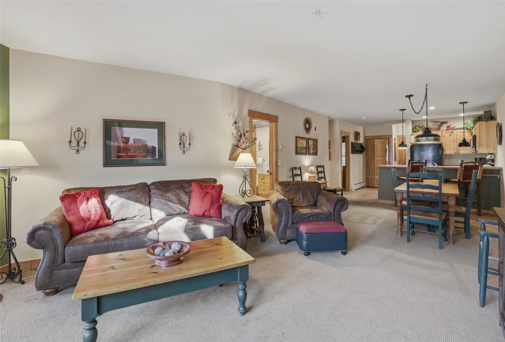 22784 Highway 6, Unit 2628 Keystone, CO 80435 - Photo 15 of 45 a living room with furniture kitchen view and a window