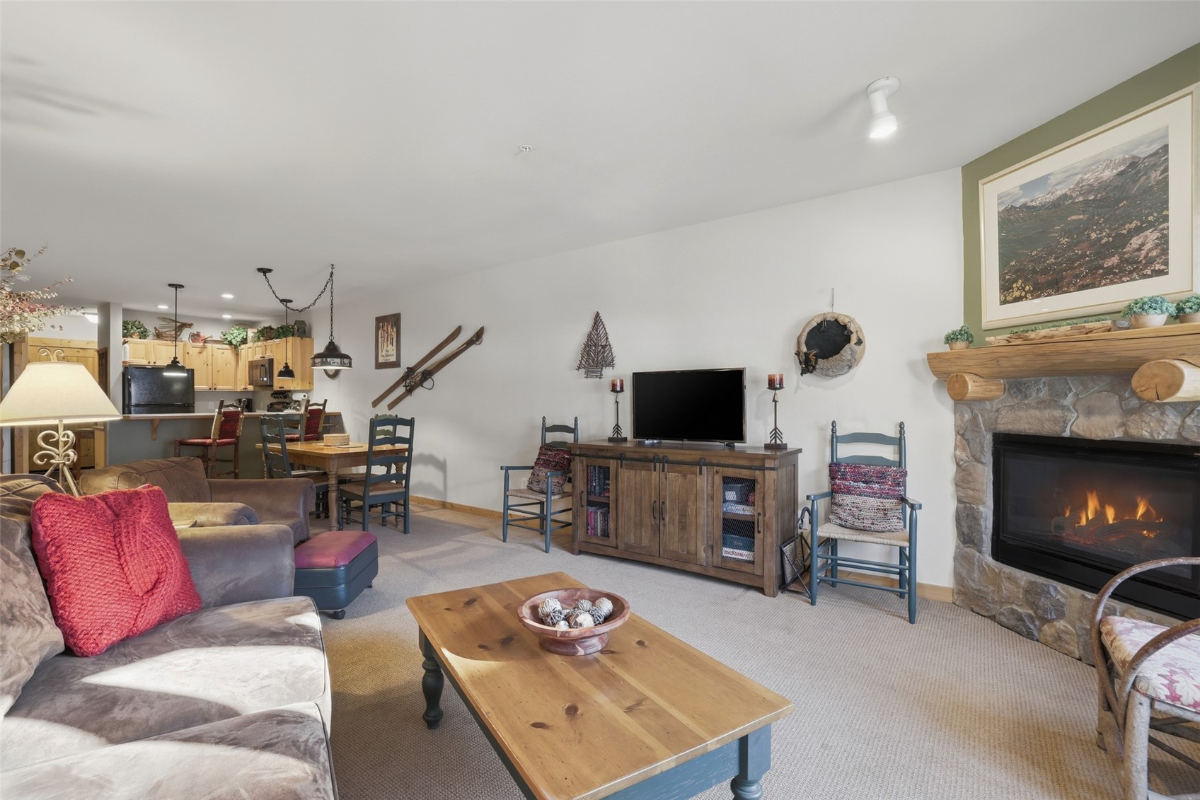 22784 Highway 6, Unit 2628 Keystone, CO 80435 - Photo 16 of 45 a living room with furniture and a flat screen tv