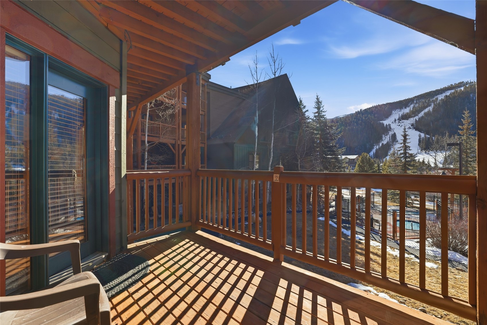 22784 Highway 6, Unit 2628 Keystone, CO 80435 - Photo 23 of 45 a view of a balcony with wooden floor
