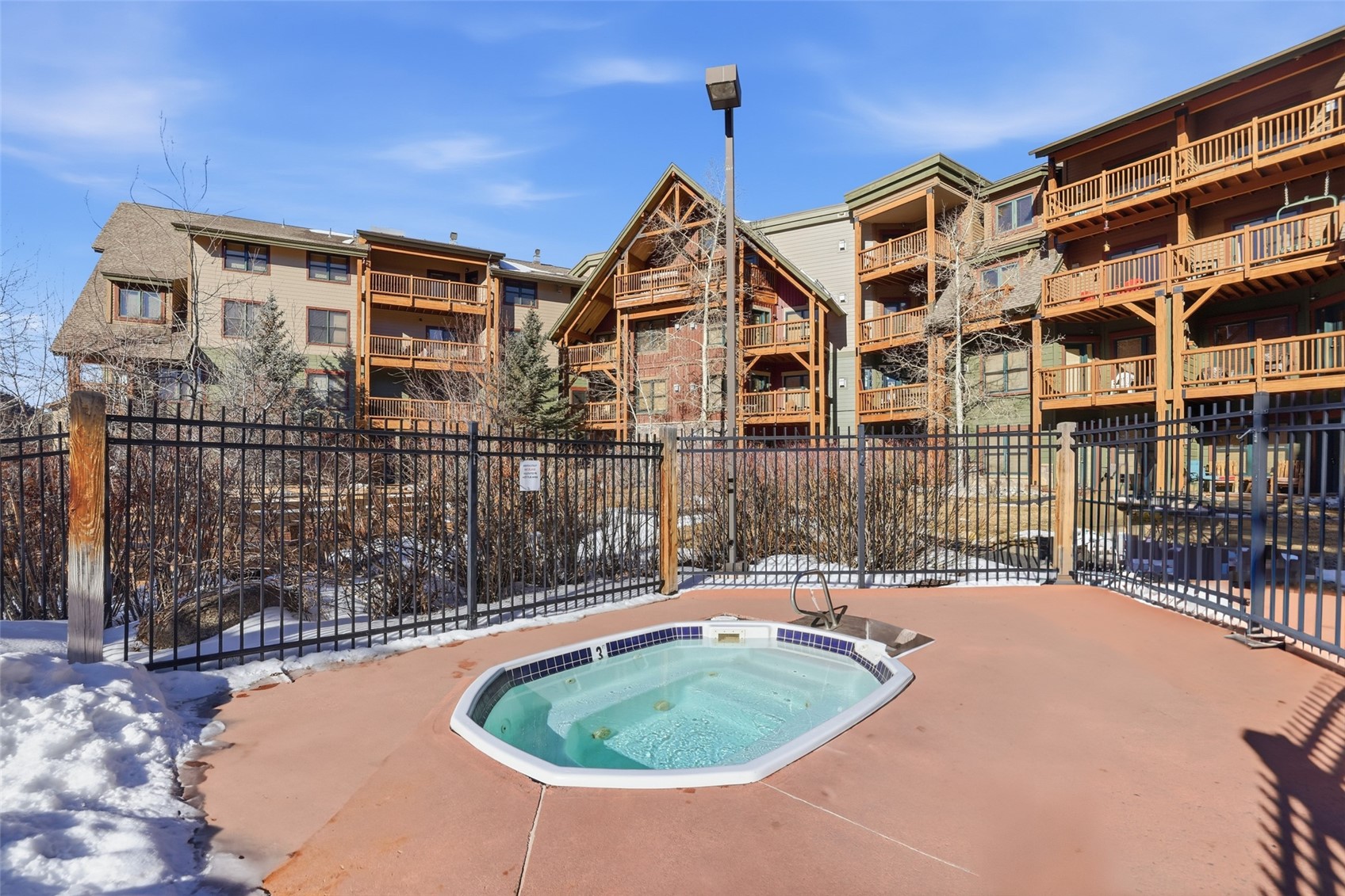 22784 Highway 6, Unit 2628 Keystone, CO 80435 - Photo 28 of 45 a backyard of a house with outdoor seating