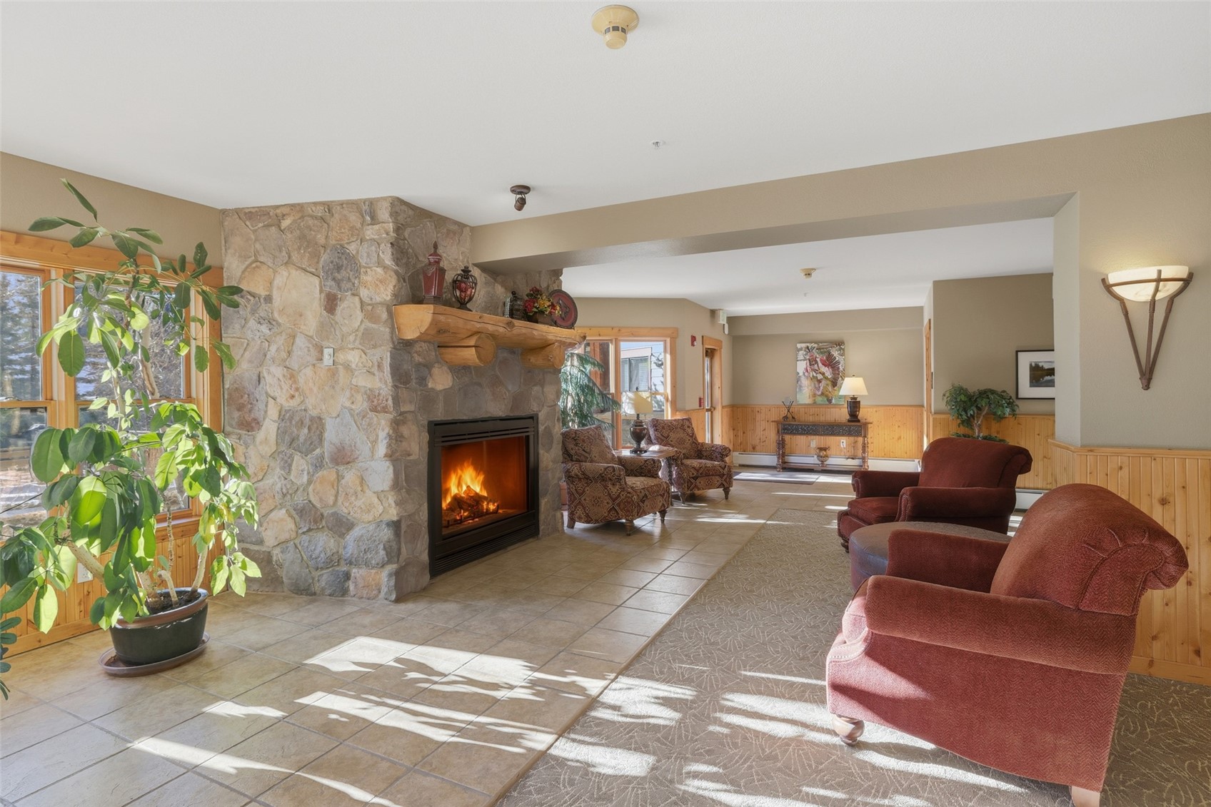 22784 Highway 6, Unit 2628 Keystone, CO 80435 - Photo 33 of 45 a living room with furniture and a fireplace