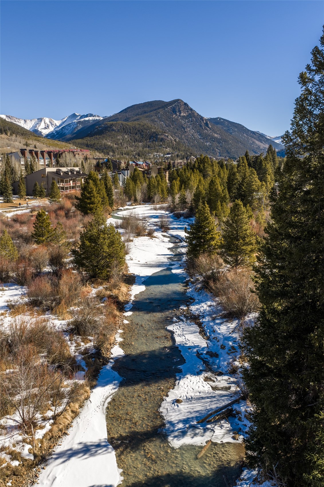 22784 Highway 6, Unit 2628 Keystone, CO 80435 - Photo 40 of 45 a view of a lake with a mountain in the background