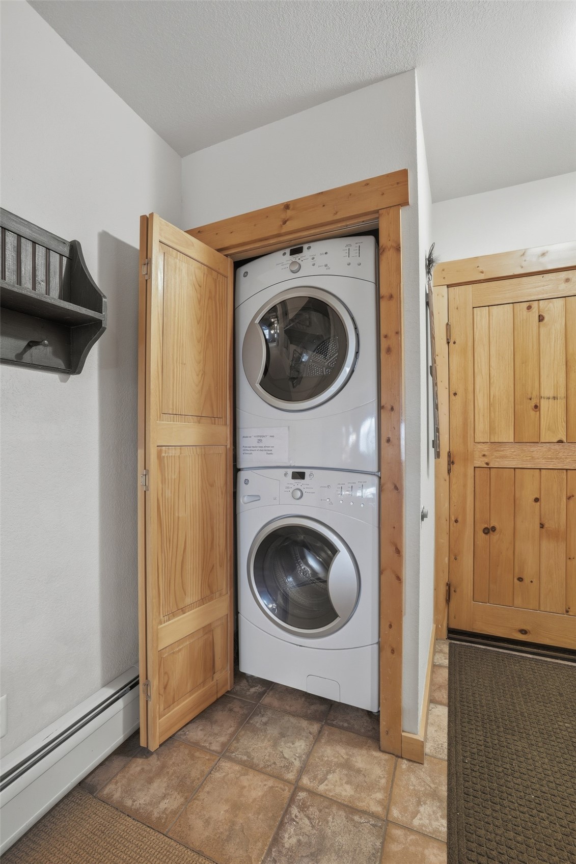 22784 Highway 6, Unit 2628 Keystone, CO 80435 - Photo 9 of 45 a view of a kitchen with washer and dryer