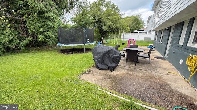 7907 Subet Road Windsor Mill, MD 21244 - Photo 28 of 31 an outdoor sitting area with furniture and garden
