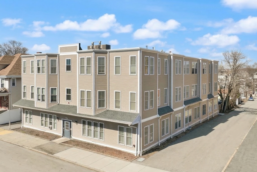 a view of a building from a balcony