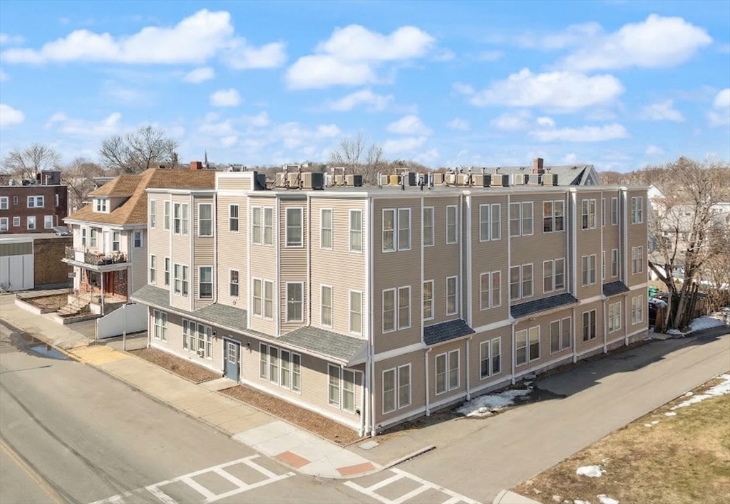 145 Lewis Street Lynn, MA 01902 - Photo 3 of 32 a view of a balcony with city view