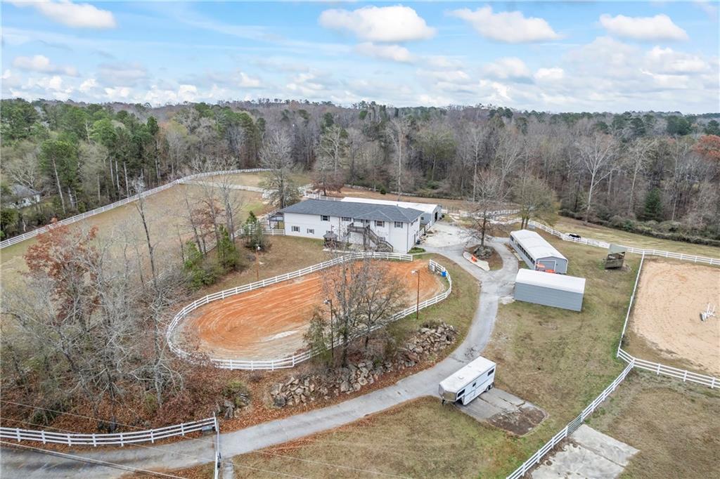 2150 Smyrna Ridge Court Southwest Conyers, GA 30094 - Photo 121 of 125 a view of a swimming pool with lake and mountain view in back