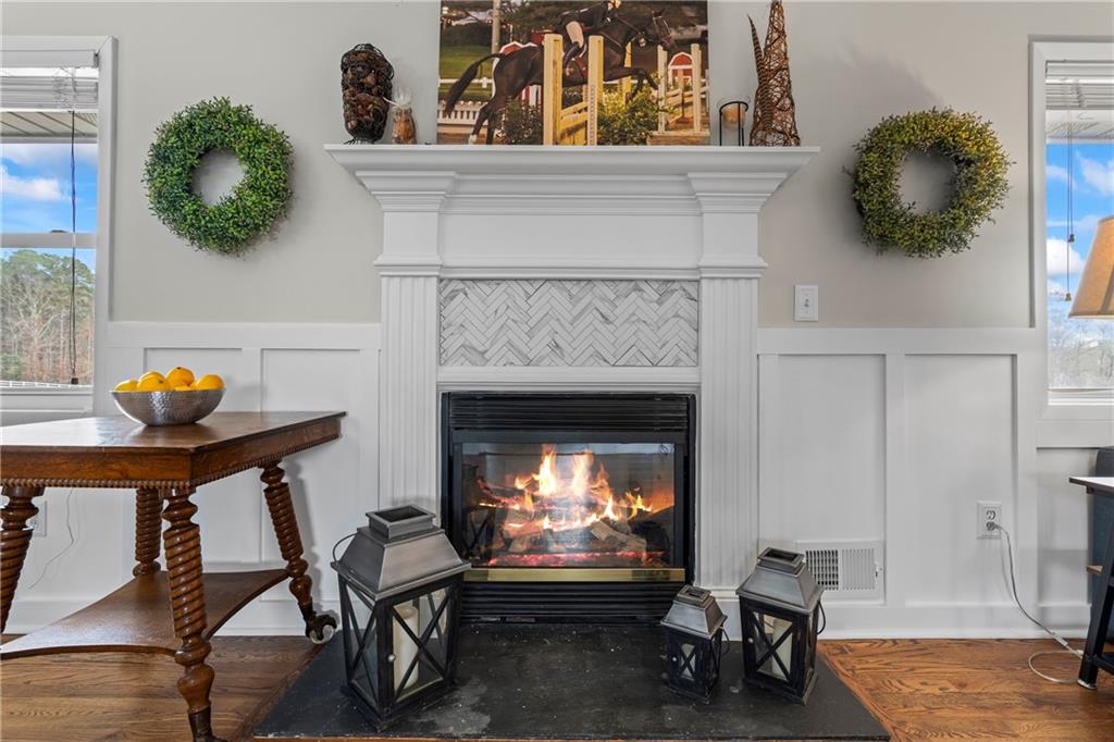 2150 Smyrna Ridge Court Southwest Conyers, GA 30094 - Photo 22 of 125 a living room with furniture and a fireplace