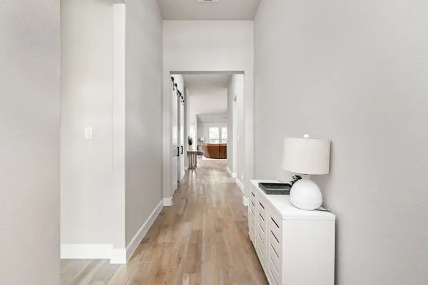 a view of a livingroom with wooden floor