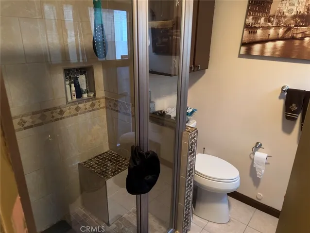 a view of a backyard with a tub and a garden