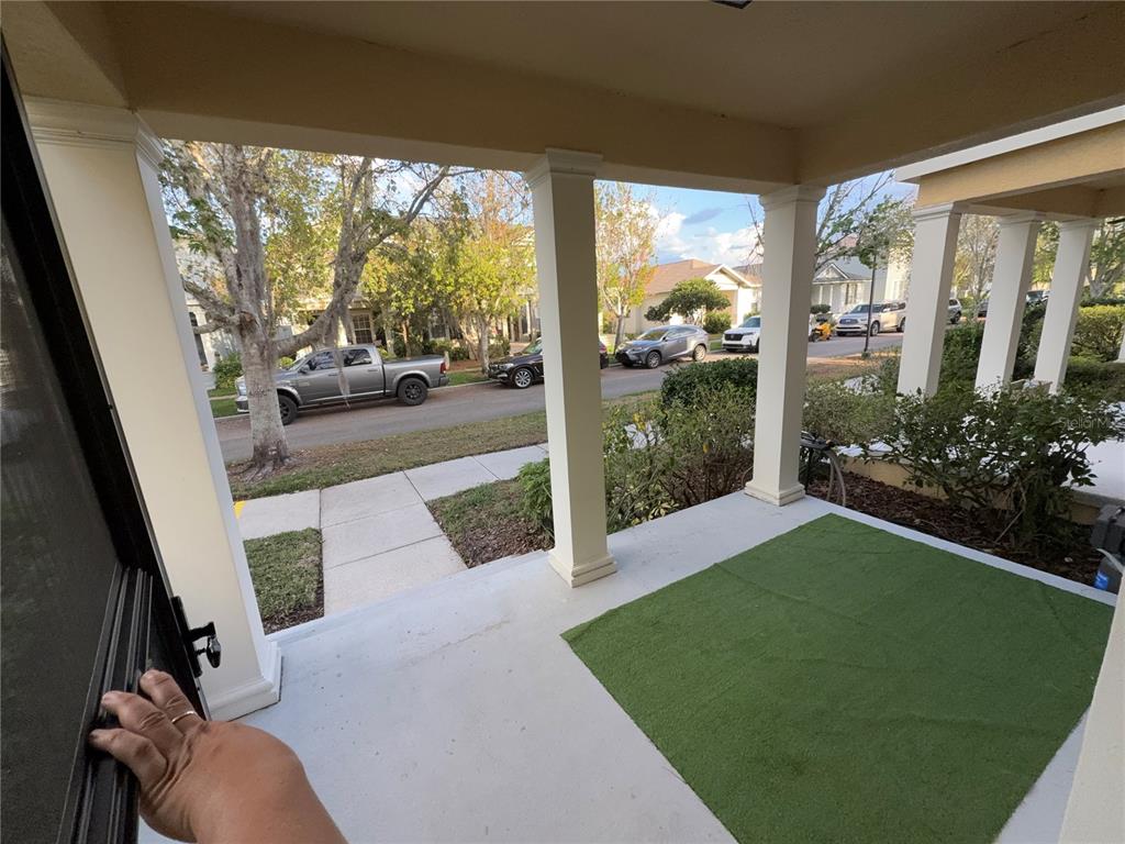3753 Herlong Street New Port Richey, FL 34655 - Photo 16 of 18 a view of a porch with furniture and garden