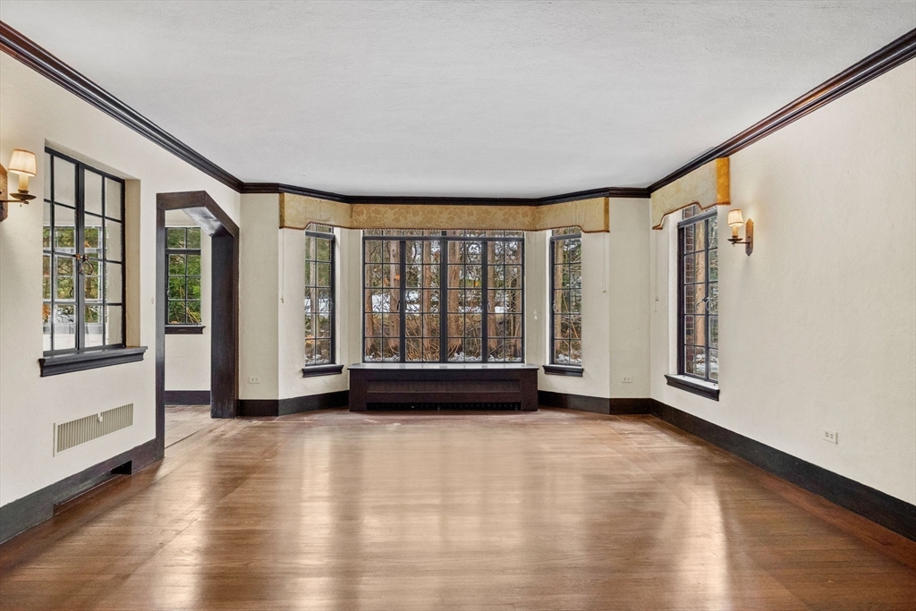 30 Swan Road Winchester, MA 01890 - Photo 11 of 38 a view of an empty room with glass door