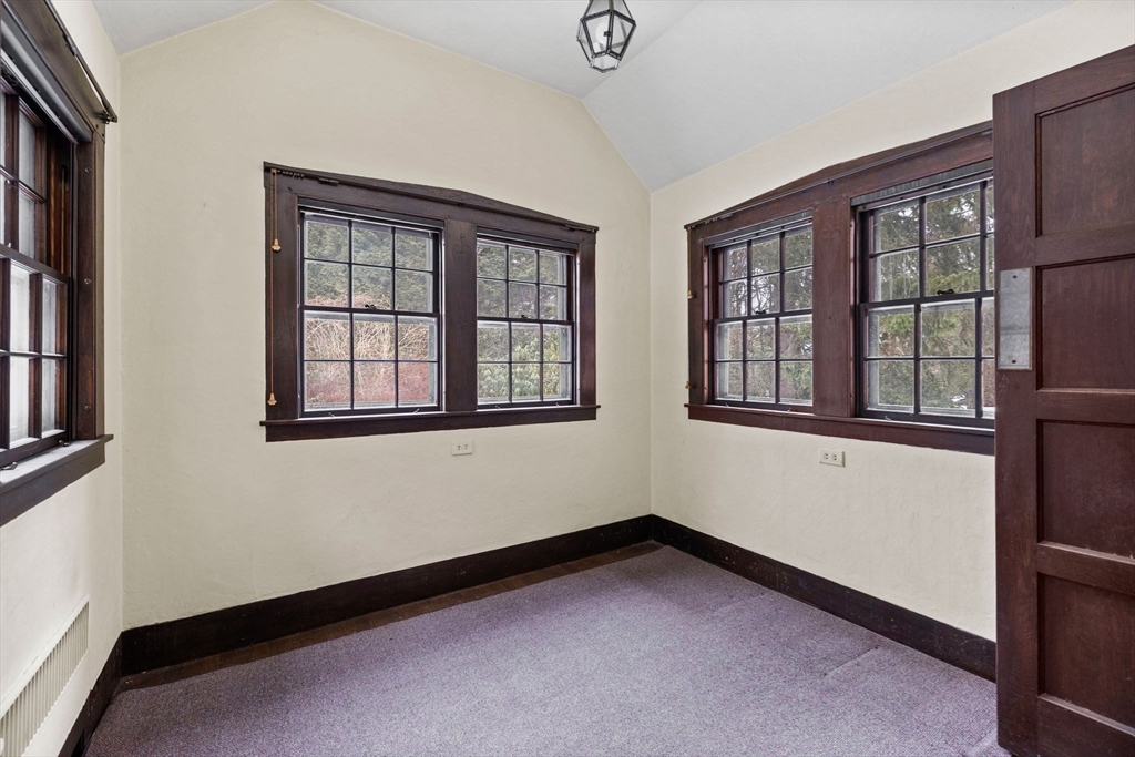 30 Swan Road Winchester, MA 01890 - Photo 18 of 38 a view of an empty room with a window