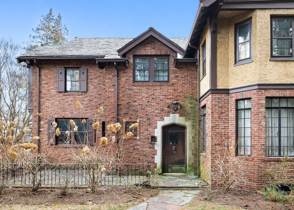 30 Swan Road Winchester, MA 01890 - Photo 2 of 38 a front view of a house with garden