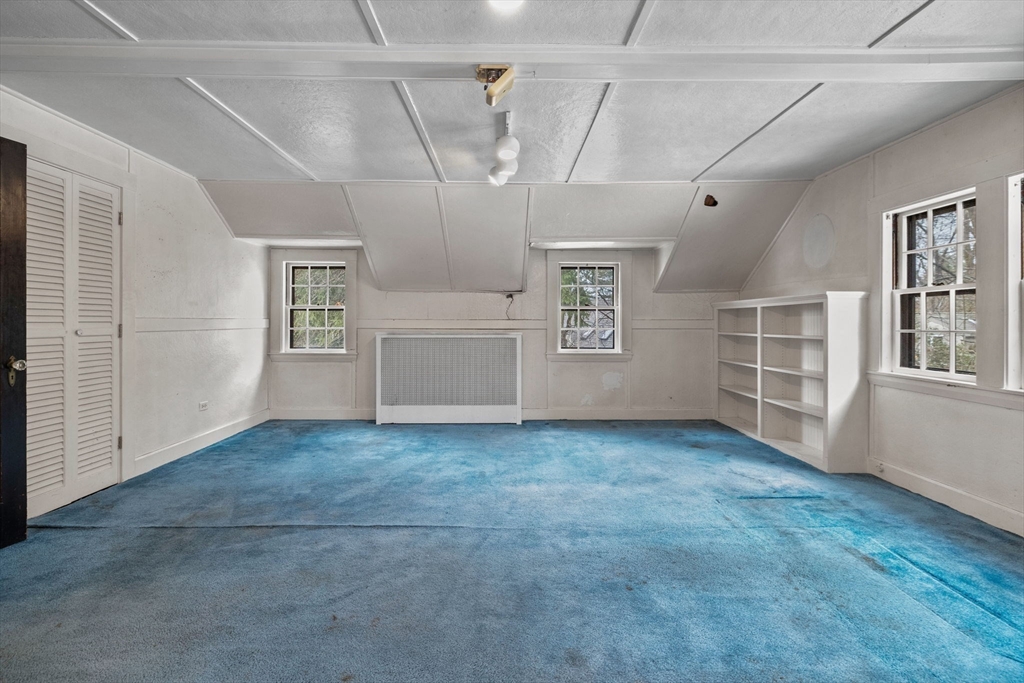 30 Swan Road Winchester, MA 01890 - Photo 34 of 38 a view of a livingroom with furniture and chandelier fan