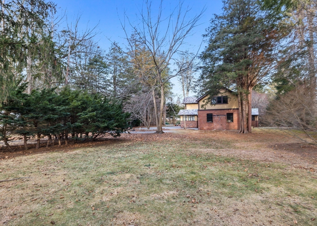 30 Swan Road Winchester, MA 01890 - Photo 37 of 38 a view of a house with a yard