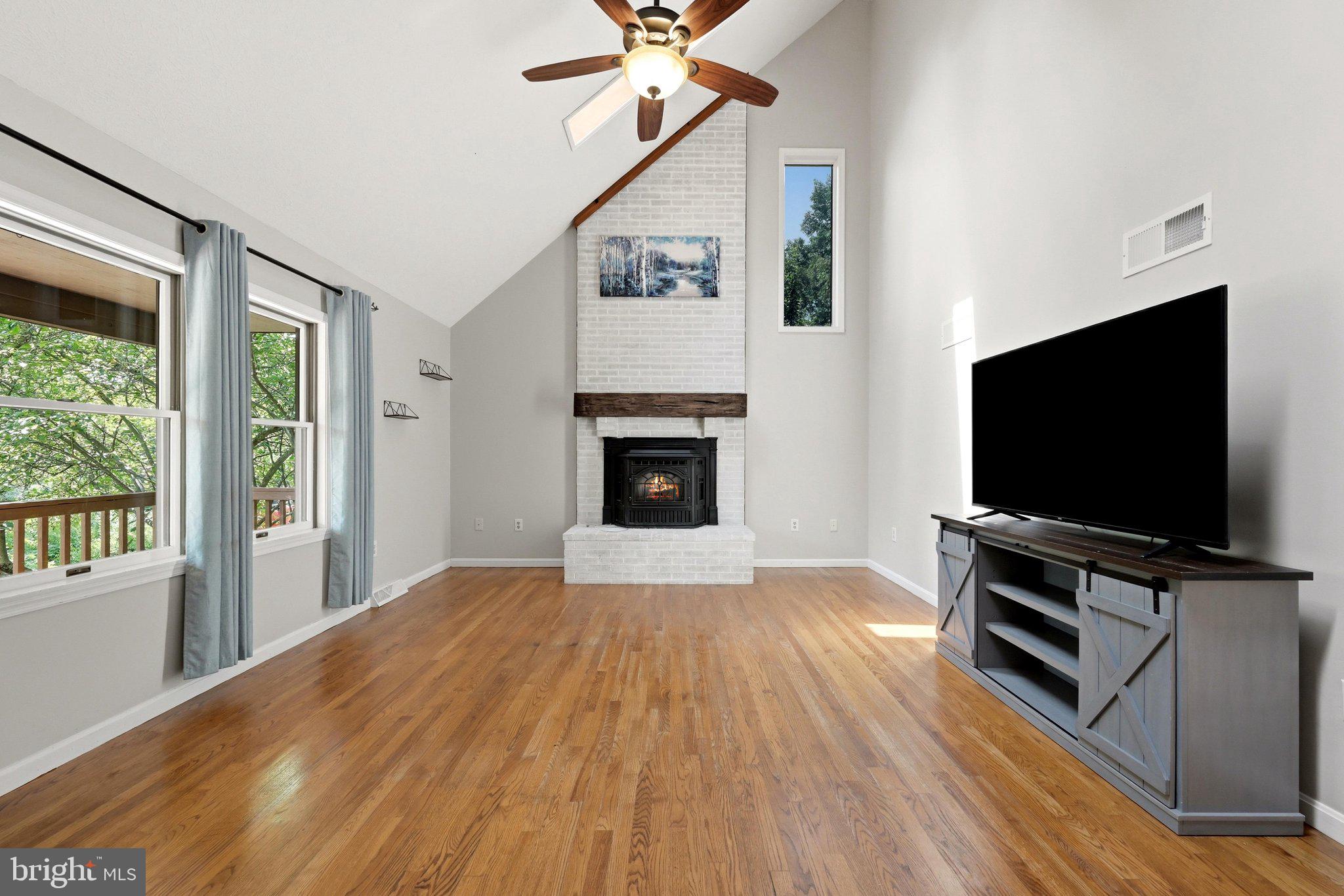 150 Holiday Road Cross Junction, VA 22625 - Photo 18 of 97 Whitewashed brick fireplace for added warmth