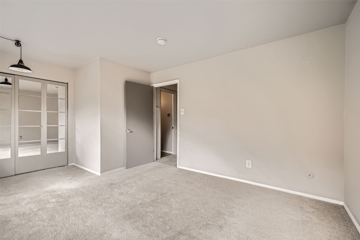 817 Valley View Drive Georgetown, CO 80444 - Photo 19 of 29 an empty room with windows and closet