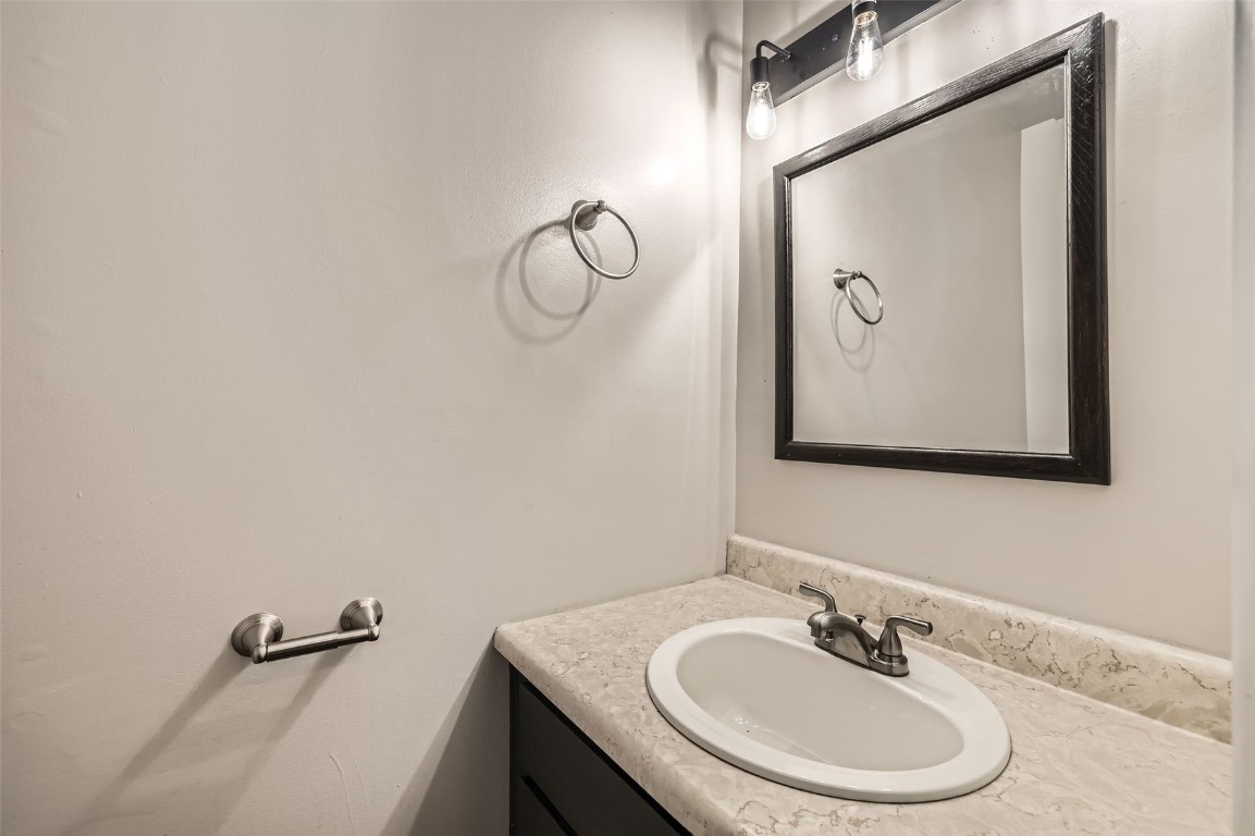 817 Valley View Drive Georgetown, CO 80444 - Photo 23 of 29 a bathroom with a sink and mirror