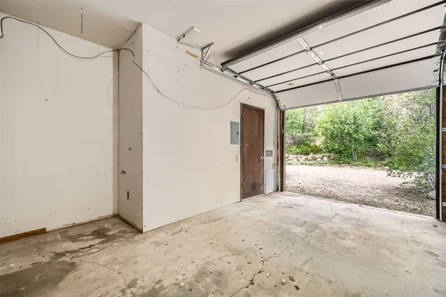 a view of a room with a large window