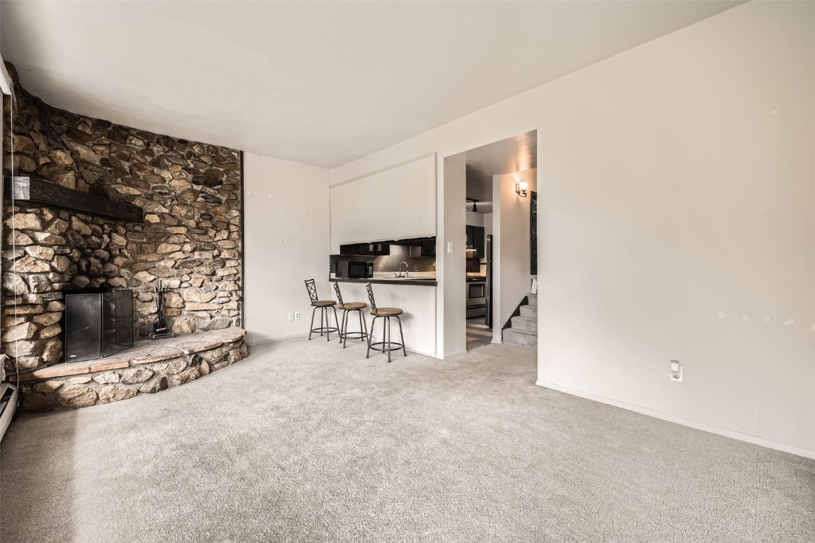 817 Valley View Drive Georgetown, CO 80444 - Photo 4 of 29 a view of livingroom with furniture and fireplace