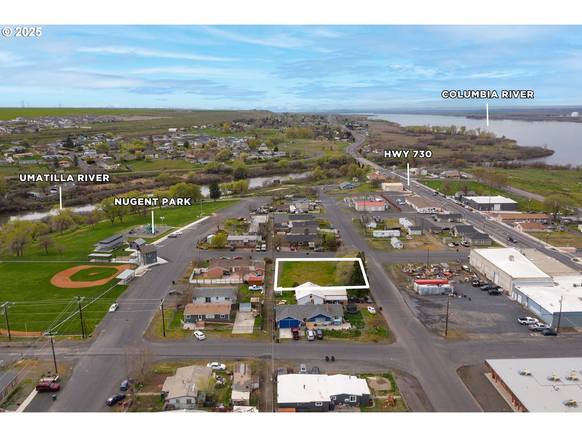 7th Umatilla, OR 97882 - Photo 7 of 12 an aerial view of residential houses with outdoor space