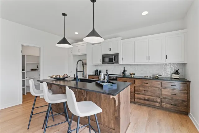 $404,500 | 2004 Southeast Oak Ridge Drive, Oak Grove, MO 64075